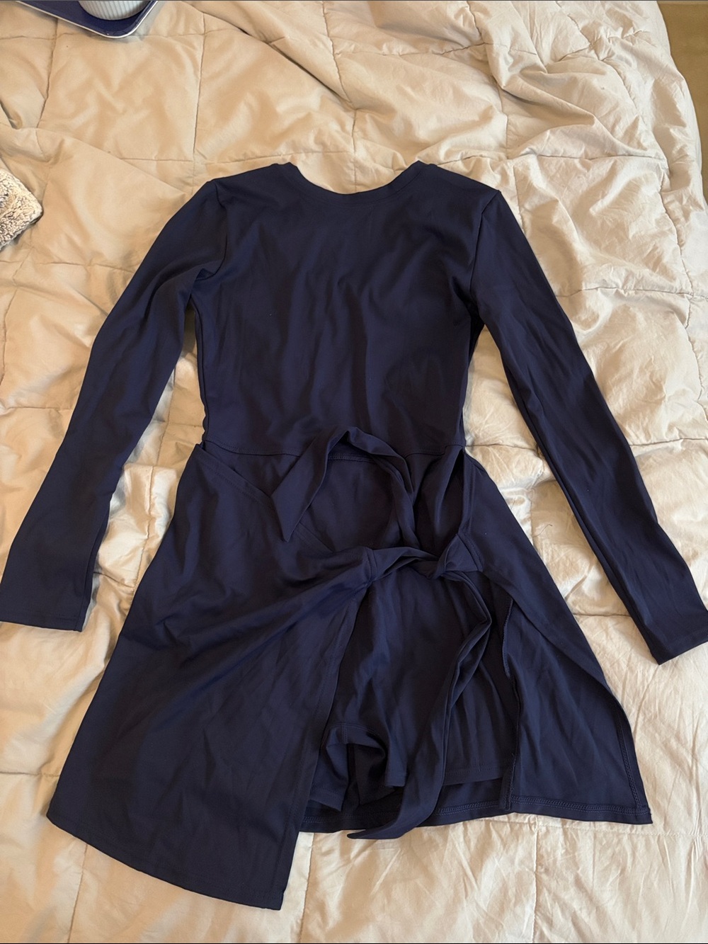 Navy long sleeve athletic tie dress